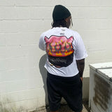 Soft wash tee with pink manga blush and layered visuals