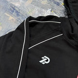 Vintage techwear hoodie with neon flame artwork