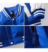 panel varsity outerwear, 2025 trend, for men, fall streetwear outfit, oversized style, layered fashion, modern aesthetic, graphic detail