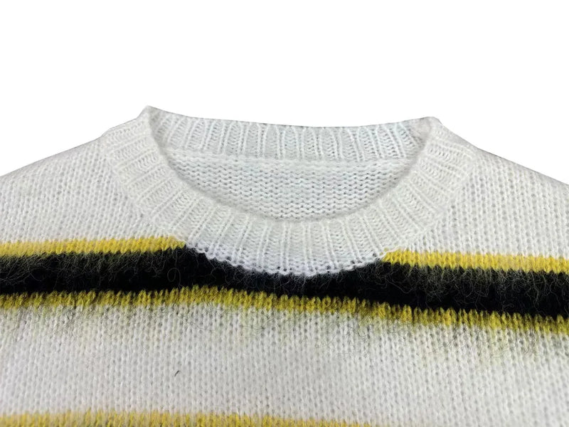 grunge knit sweater with heavyweight fabric, layered urban look for cold weather, street fashion menswear trend for seasonal 