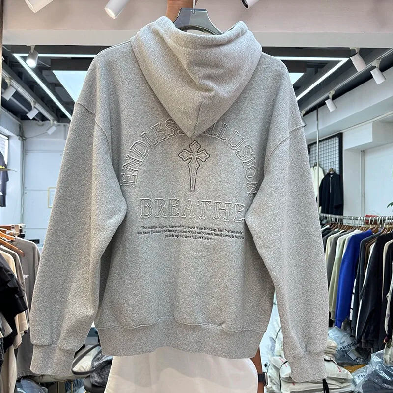 Techwear-inspired hoodie with futuristic holographic accents