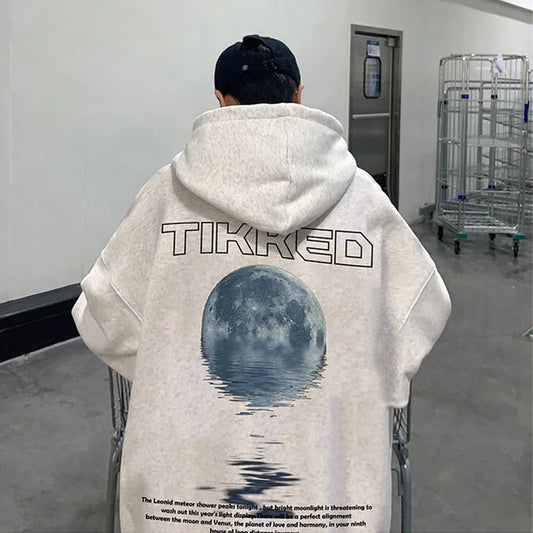 Urban streetwear hoodie with hustle mindset typography
