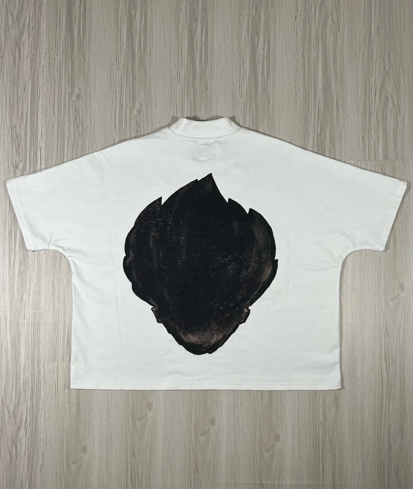 pastel streetwear anime tee with bold hip hop text overlay