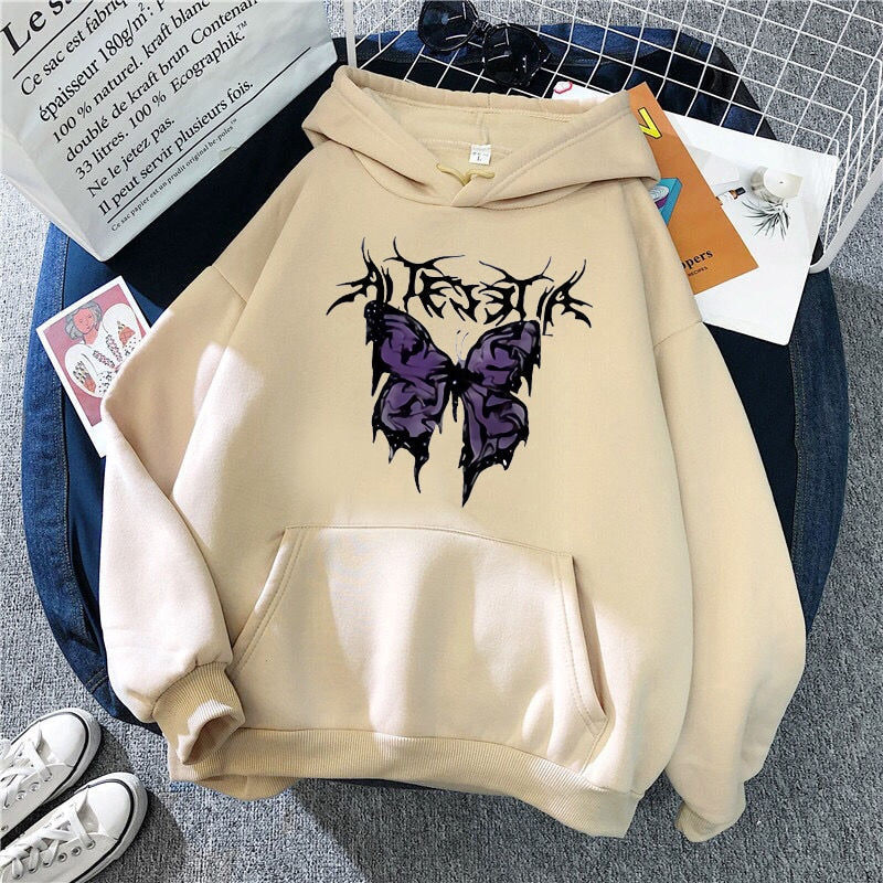 Oversized vintage hoodie with gothic and Y2K graphic design, relaxed streetwear silhouette, and retro urban aesthetic built for daily wear and layered outfits.
