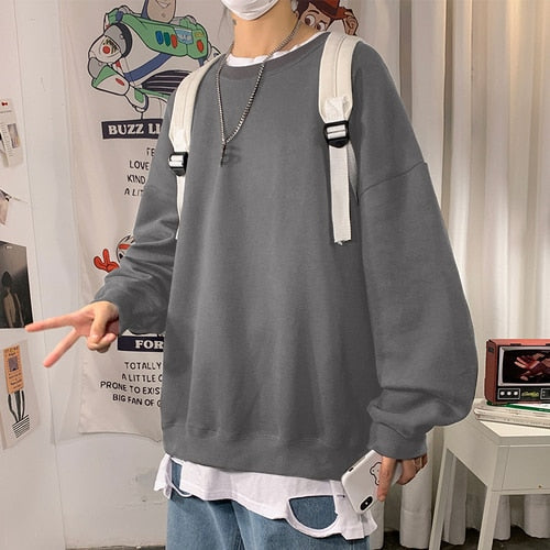 Anime‑inspired oversized sweatshirt with Japanese street fashion cues, bold graphic art and clean finish, ideal for urban layering and statement street style.