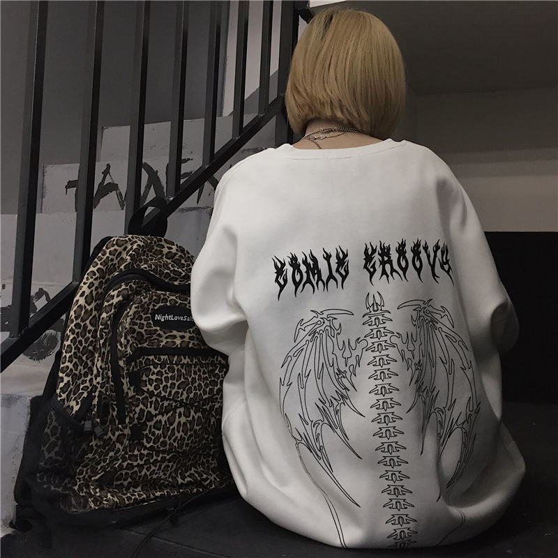 Dark gothic hoodie with retro Y2K spirit, heavyweight feel and durable stitching, a versatile piece for skate, alt, and urban outfits all season.